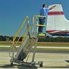 Performing maintenance on aircraft, relying on stability of adjustable height work platform
